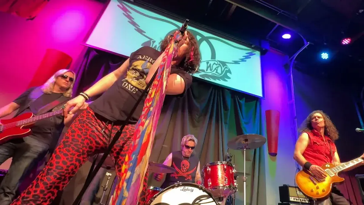 Last Child NYC Aerosmith tribute band performing live at Main Street Crossing in Tomball, Texas