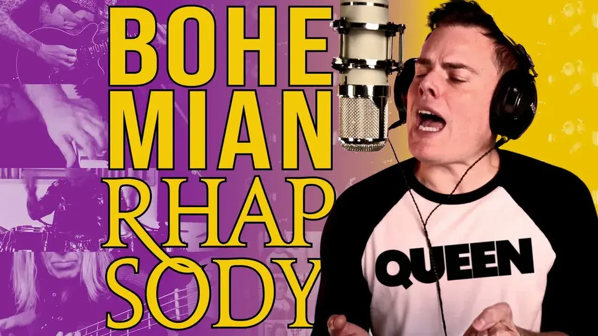 Marc Martel singing Bohemian Rhapsody at a studio microphone in a Queen shirt